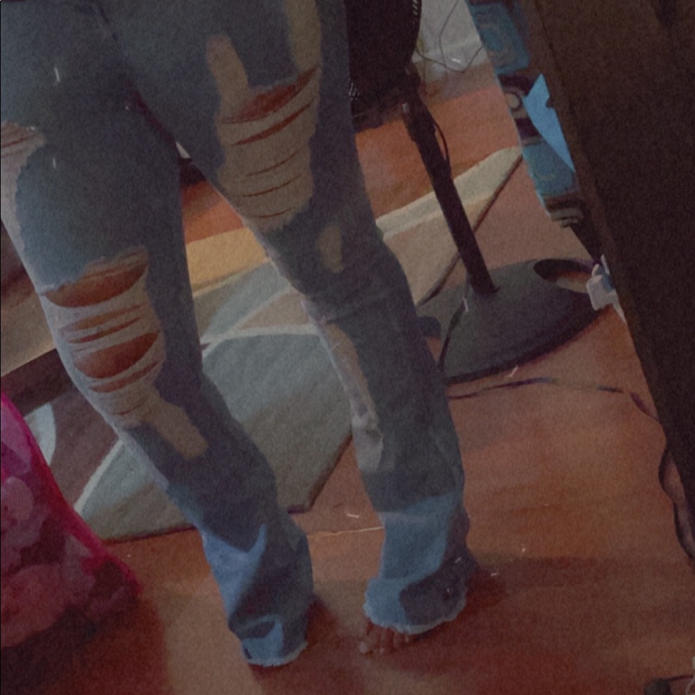 New Flare Leg Distressed Jeans.